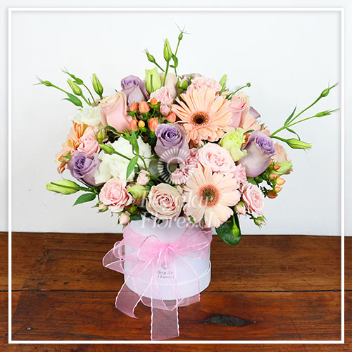 Caja cilindro primaveral | Regalar Flores, Envio de flores, desayunos y regalos a domicilio