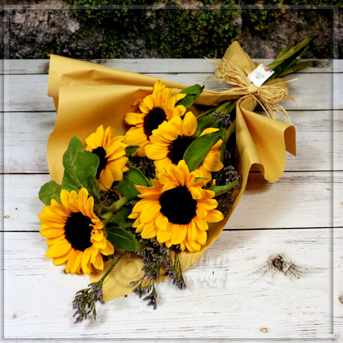 Ramo 5 girasoles en kraft | Regalar Flores, Envio de flores, desayunos y regalos a domicilio